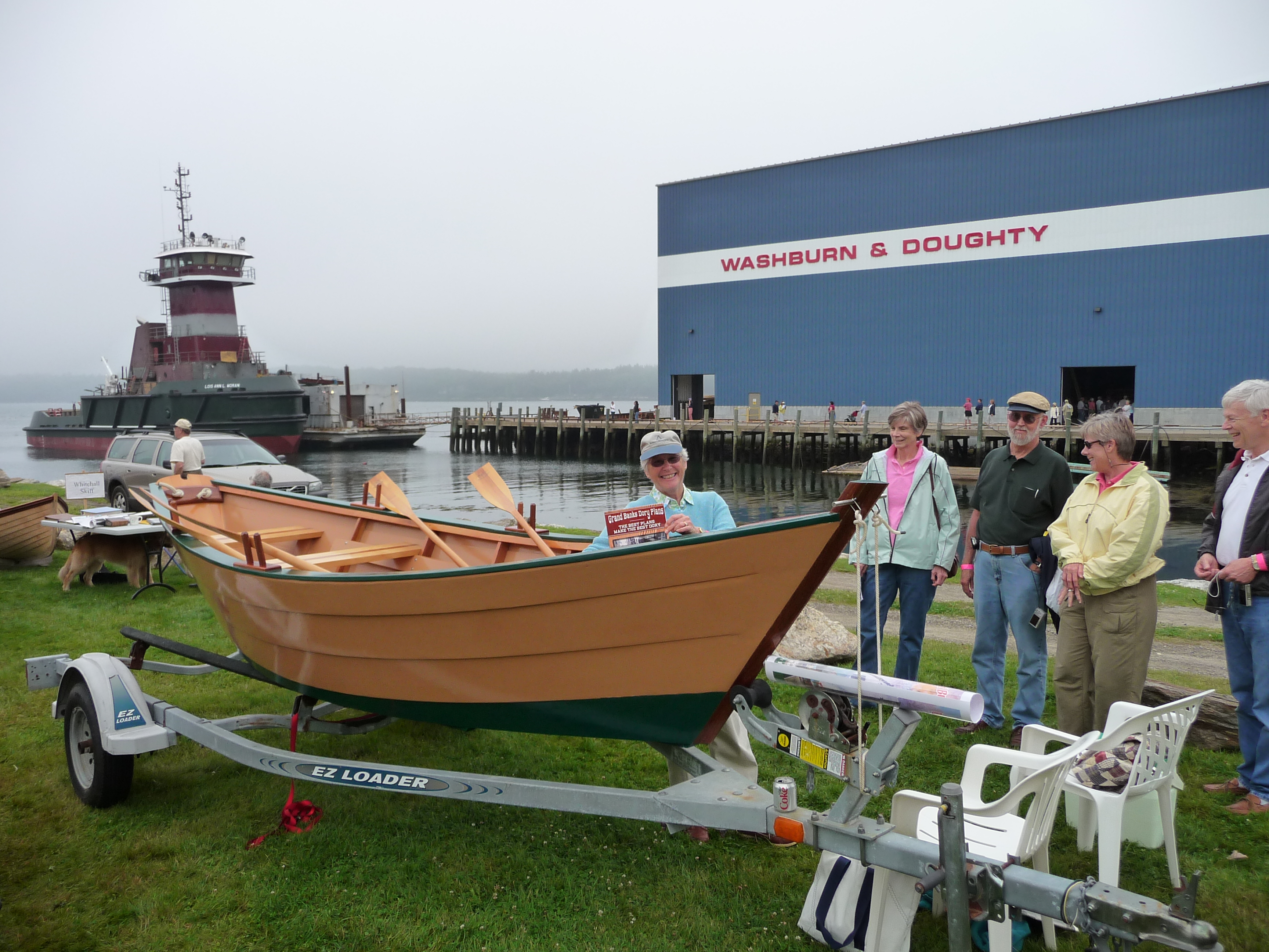 Customer-built Grand Banks dory proudly displayed at a boat show