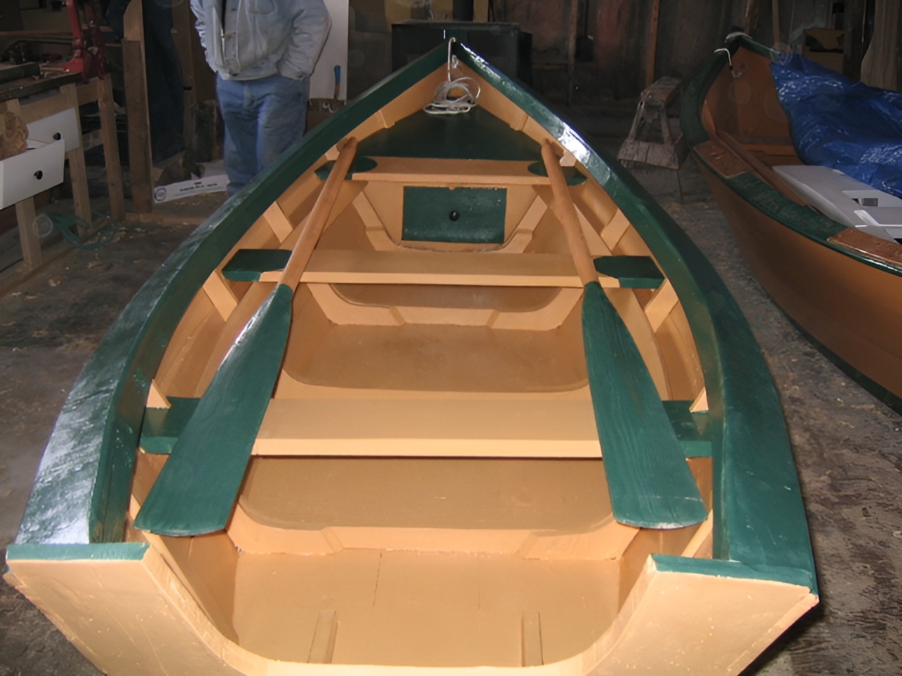Another completed Grand Banks dory in a workshop, ready for launch