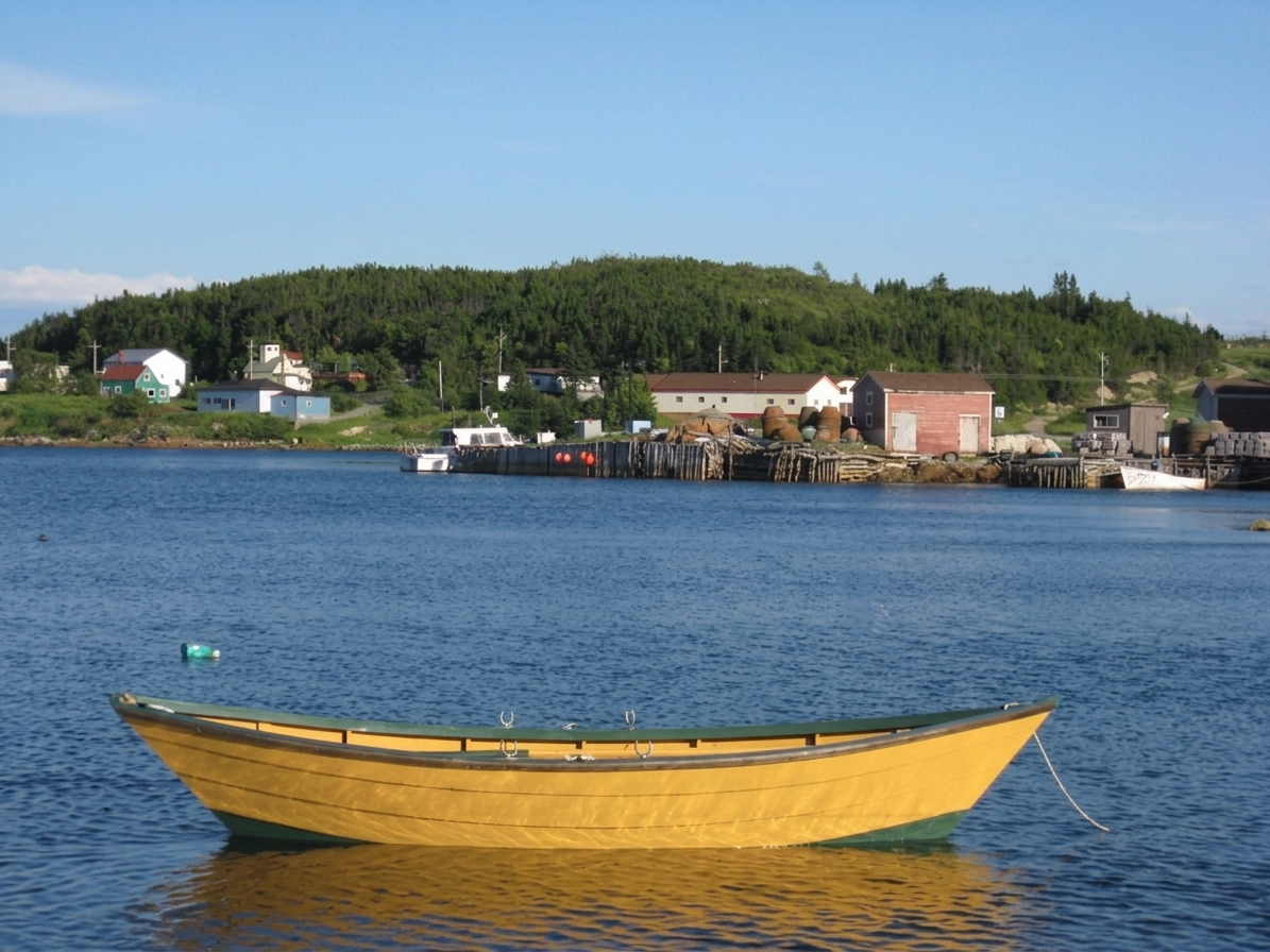 Finished 16' Grand Banks dory on the water